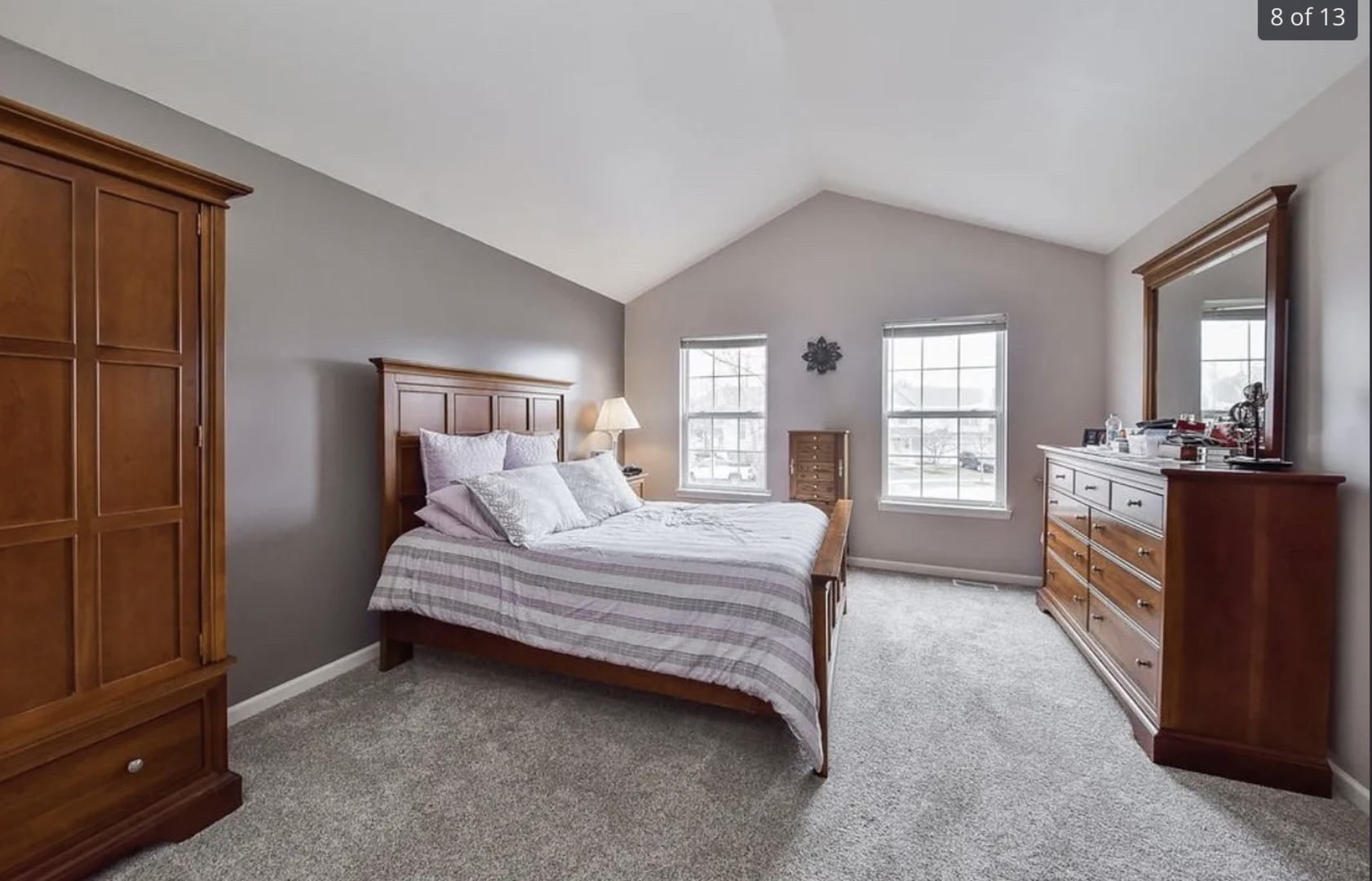 2221 Sunrise Circle, Unit 2221 Aurora, IL 60503 - Photo 10 of 15 a spacious bedroom with a bed and wooden floor