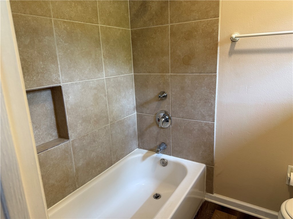 608 Stevenson Avenue Sebastian, FL 32958 - Photo 22 of 22 a bathroom with a tub and a shower