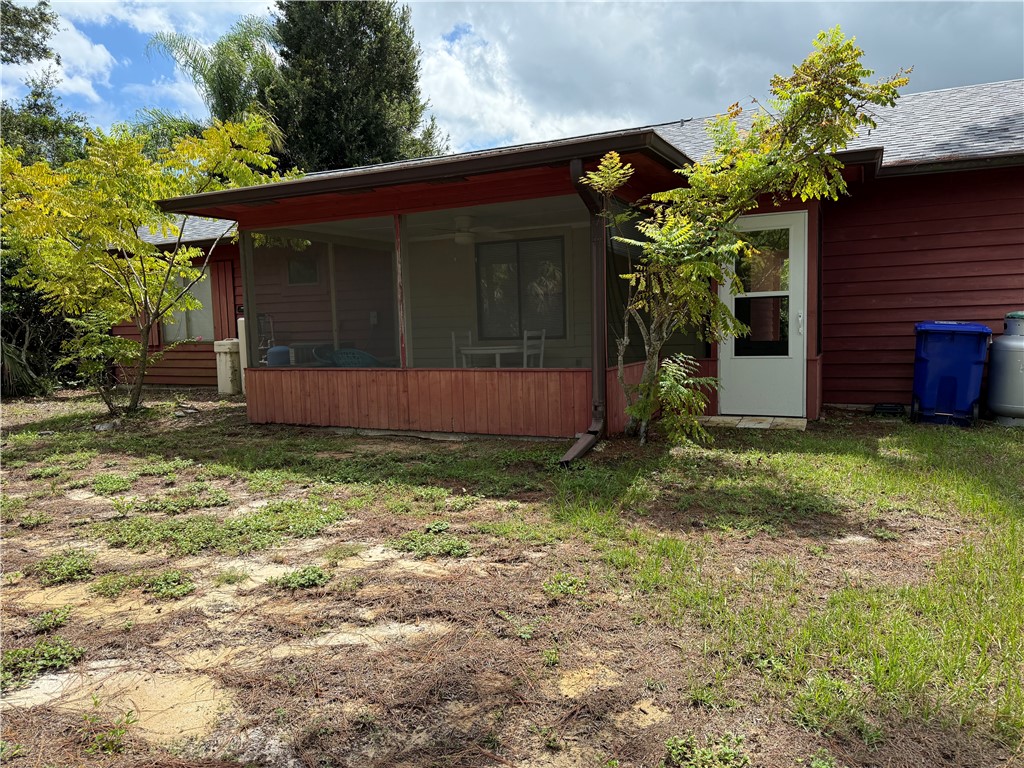 608 Stevenson Avenue Sebastian, FL 32958 - Photo 8 of 22 a view of a house with a yard