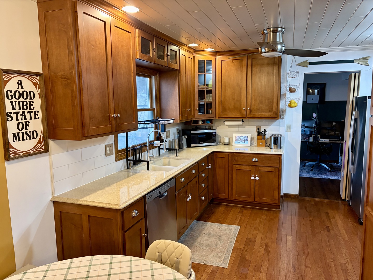 66 Holiday Drive Clinton, IL 61727 - Photo 13 of 43 a kitchen with a sink cabinets and wooden floor