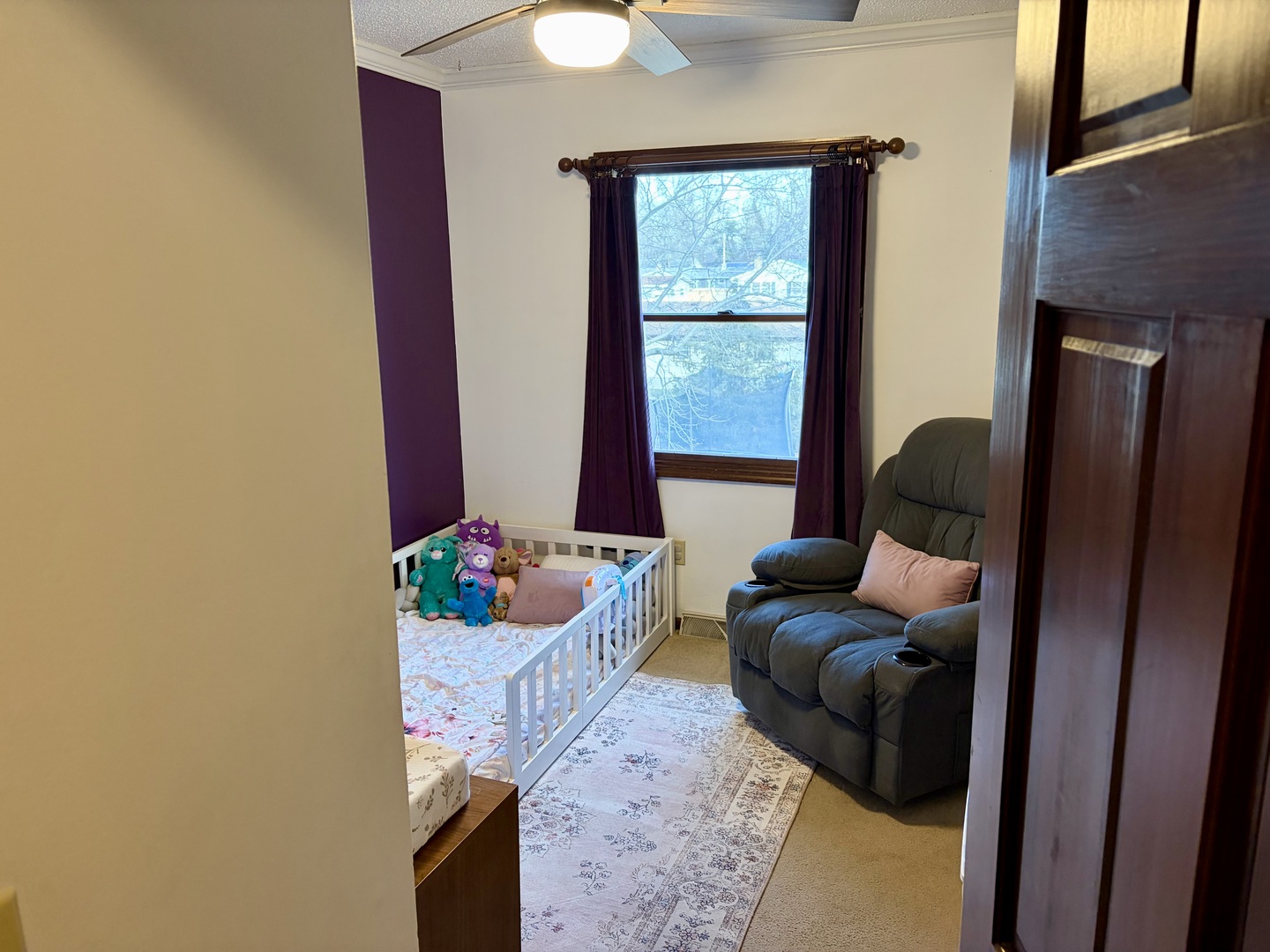 66 Holiday Drive Clinton, IL 61727 - Photo 22 of 43 a living room with furniture and a window