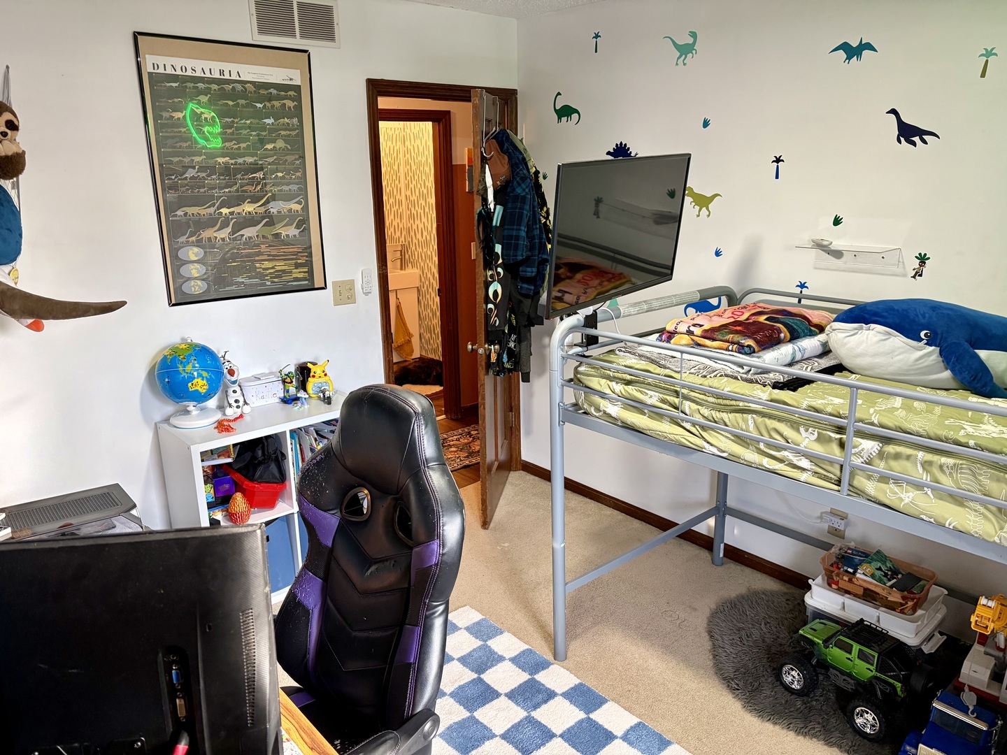 66 Holiday Drive Clinton, IL 61727 - Photo 26 of 43 a bed sitting in a bedroom next to a window