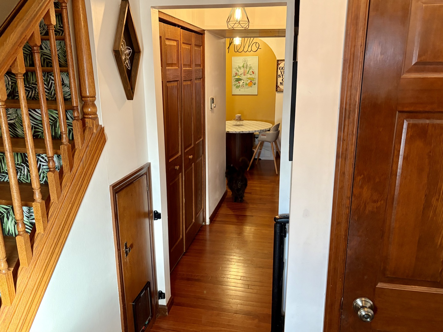 66 Holiday Drive Clinton, IL 61727 - Photo 7 of 43 a view of a hallway with wooden floor and staircase