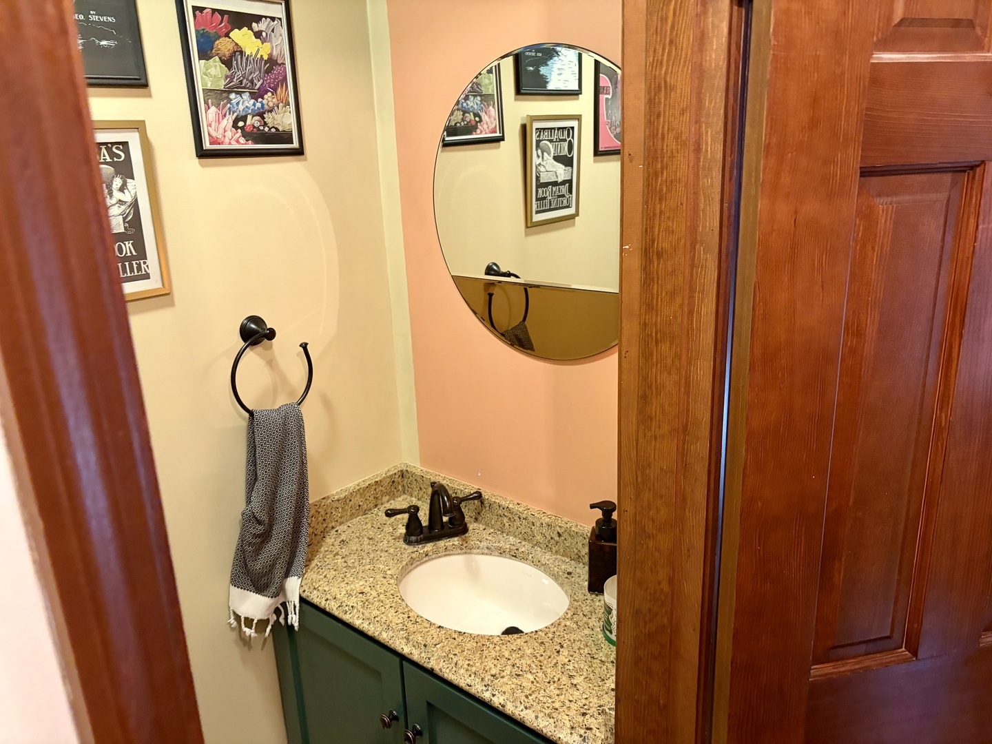 66 Holiday Drive Clinton, IL 61727 - Photo 8 of 43 a bathroom with a granite countertop sink and a mirror