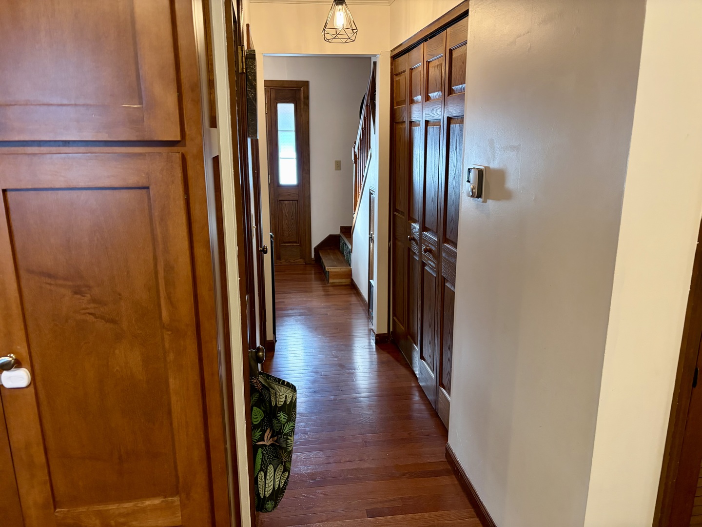 66 Holiday Drive Clinton, IL 61727 - Photo 9 of 43 a hallway with wooden floor and closet