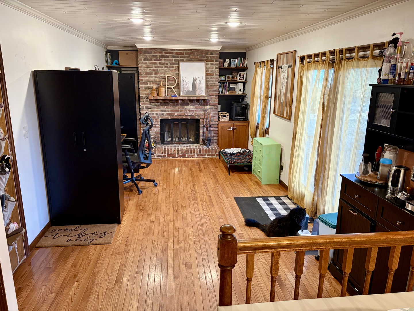 66 Holiday Drive Clinton, IL 61727 - Photo 10 of 43 a living room with furniture and a fireplace