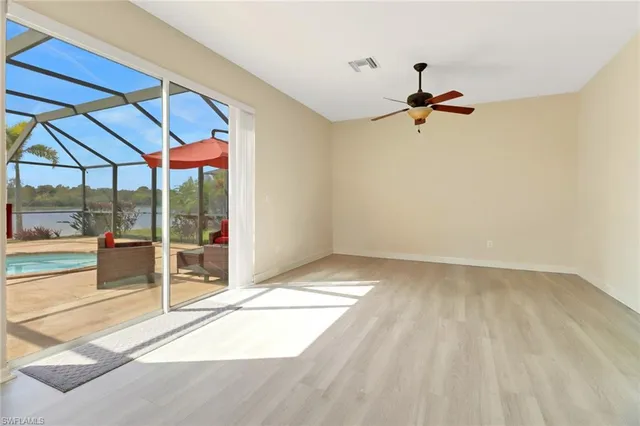 a view of empty room with windows