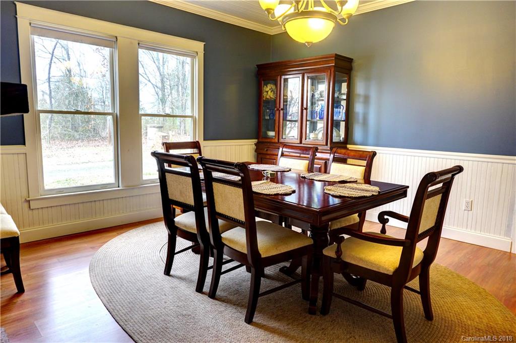 2425 Chesnee Road Columbus, NC 28722 - Photo 11 of 35 a view of a dining room with furniture and window