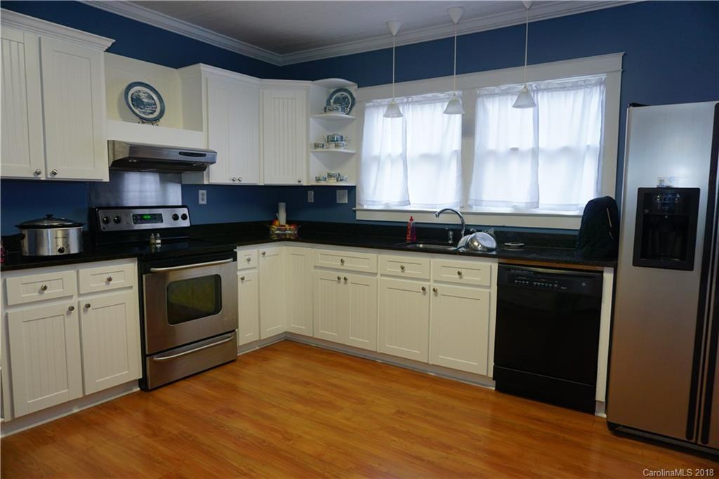 2425 Chesnee Road Columbus, NC 28722 - Photo 14 of 35 a kitchen with a sink stove and microwave
