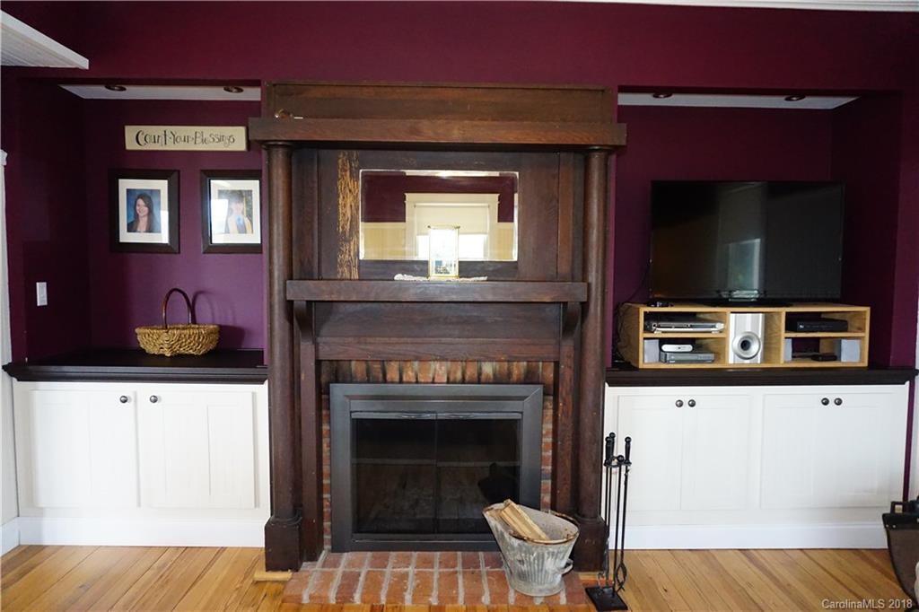 2425 Chesnee Road Columbus, NC 28722 - Photo 21 of 35 a living room with furniture and a fireplace