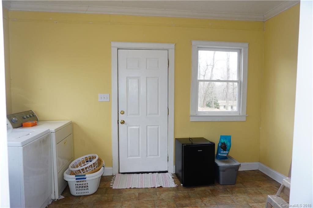 2425 Chesnee Road Columbus, NC 28722 - Photo 24 of 35 a living room with a couch and a window