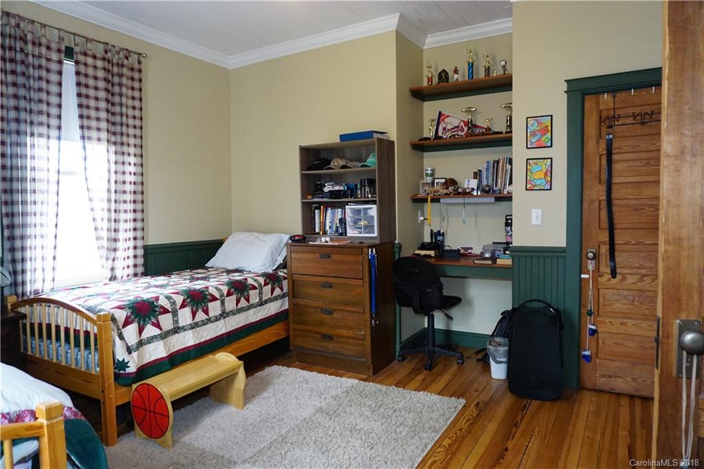 2425 Chesnee Road Columbus, NC 28722 - Photo 26 of 35 a bedroom with a bed and furniture