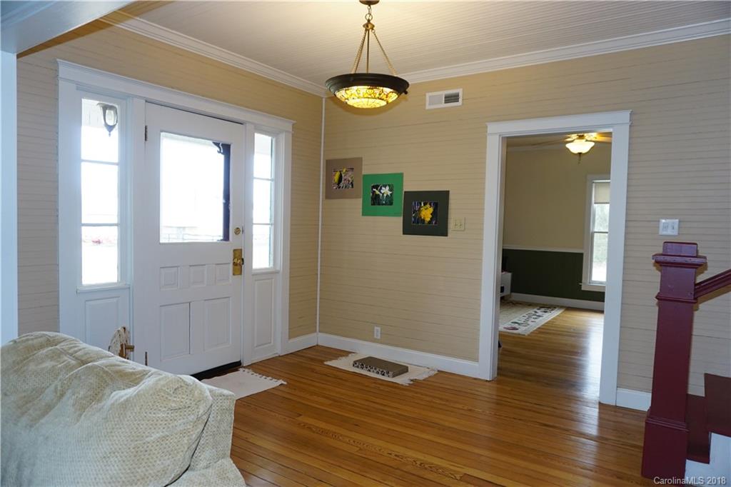 2425 Chesnee Road Columbus, NC 28722 - Photo 8 of 35 a bedroom with a bed and a window