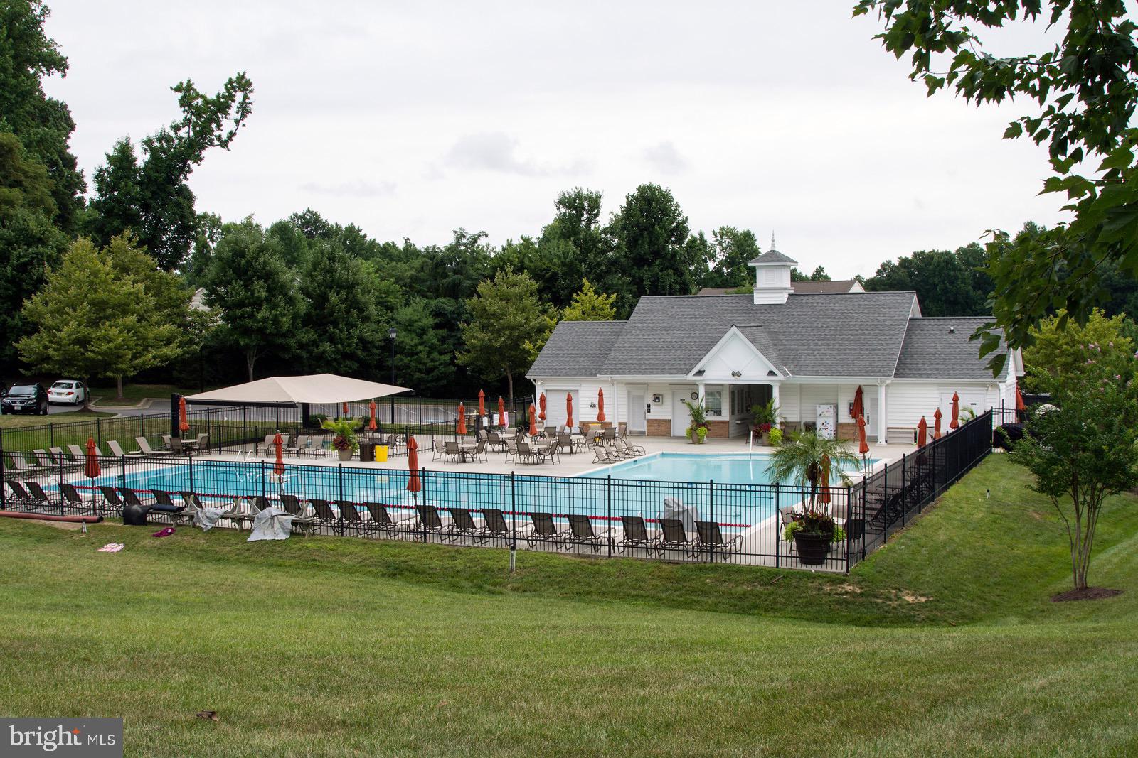17 Perder Lane Edgewater, MD 21037 - Photo 105 of 115 a front view of a house with garden