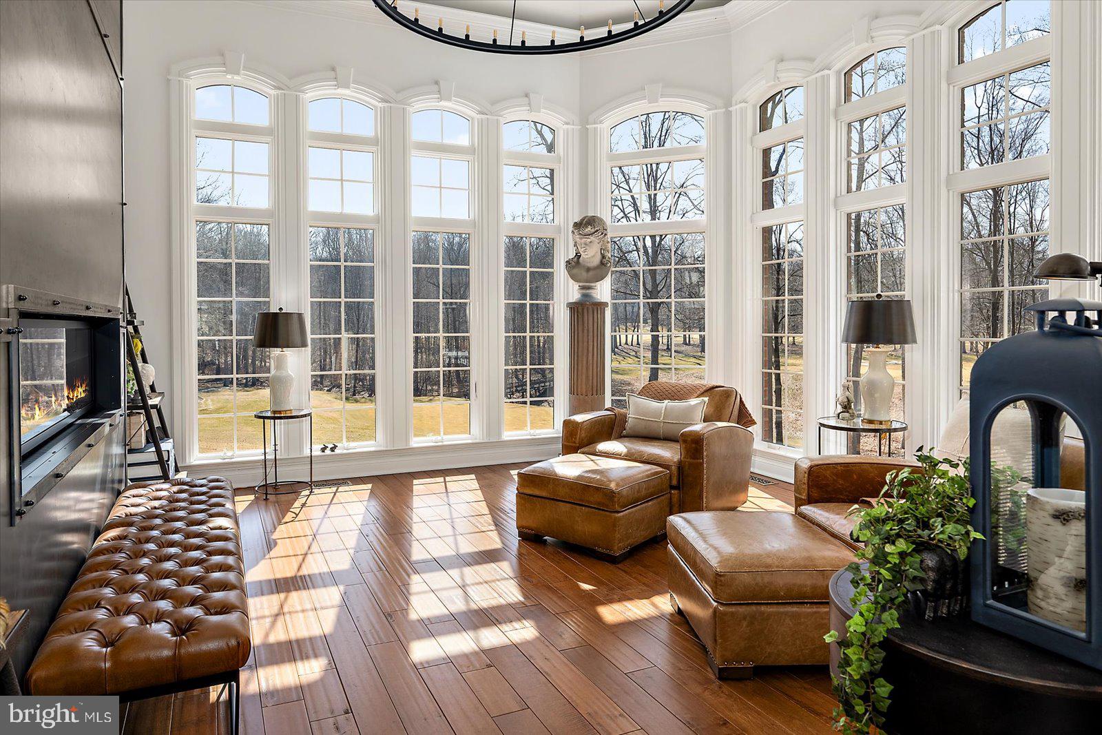 17 Perder Lane Edgewater, MD 21037 - Photo 16 of 115 a living room with furniture and a floor to ceiling window