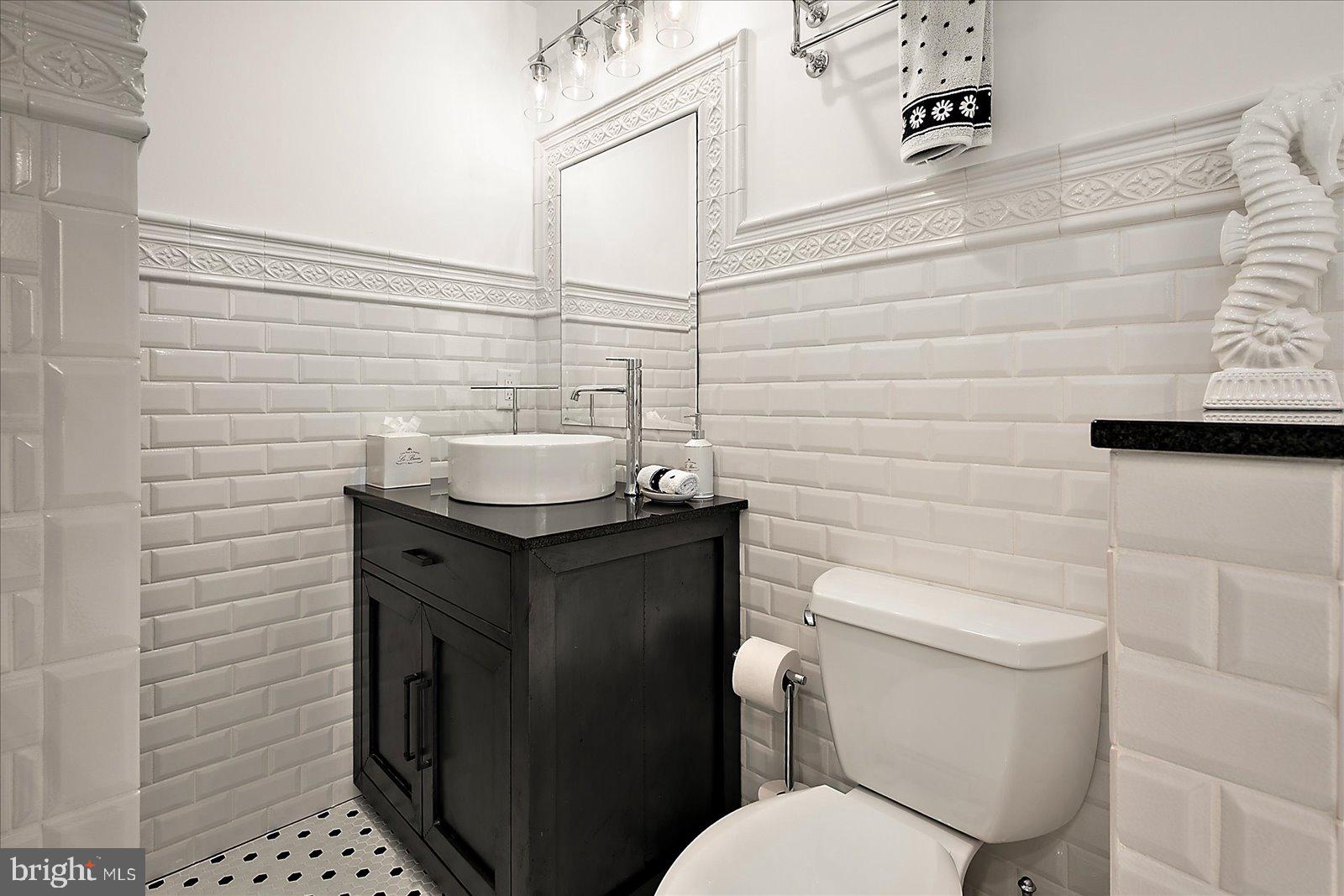 17 Perder Lane Edgewater, MD 21037 - Photo 56 of 115 a bathroom with a toilet and a sink