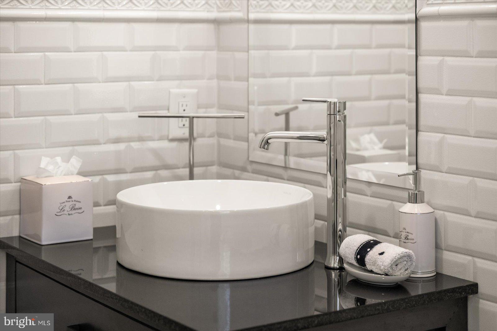 17 Perder Lane Edgewater, MD 21037 - Photo 57 of 115 a view of bathroom with a sink and mirror