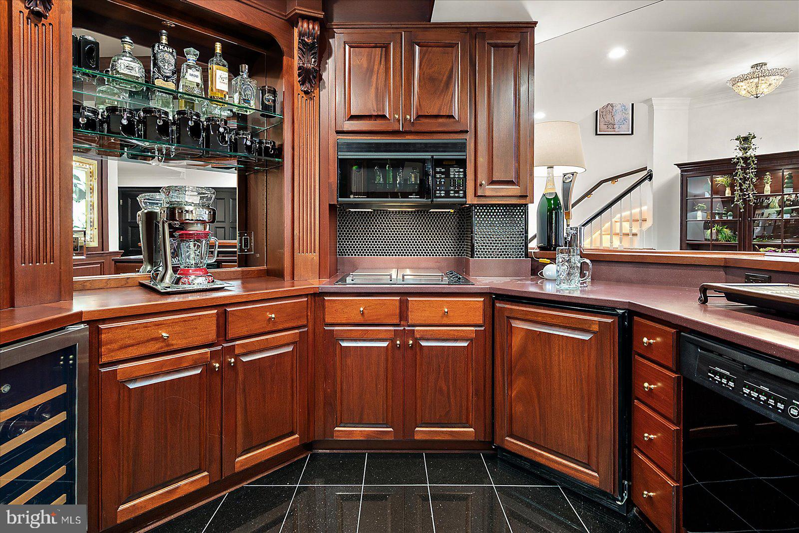 17 Perder Lane Edgewater, MD 21037 - Photo 67 of 115 a kitchen with stainless steel appliances a sink and cabinets