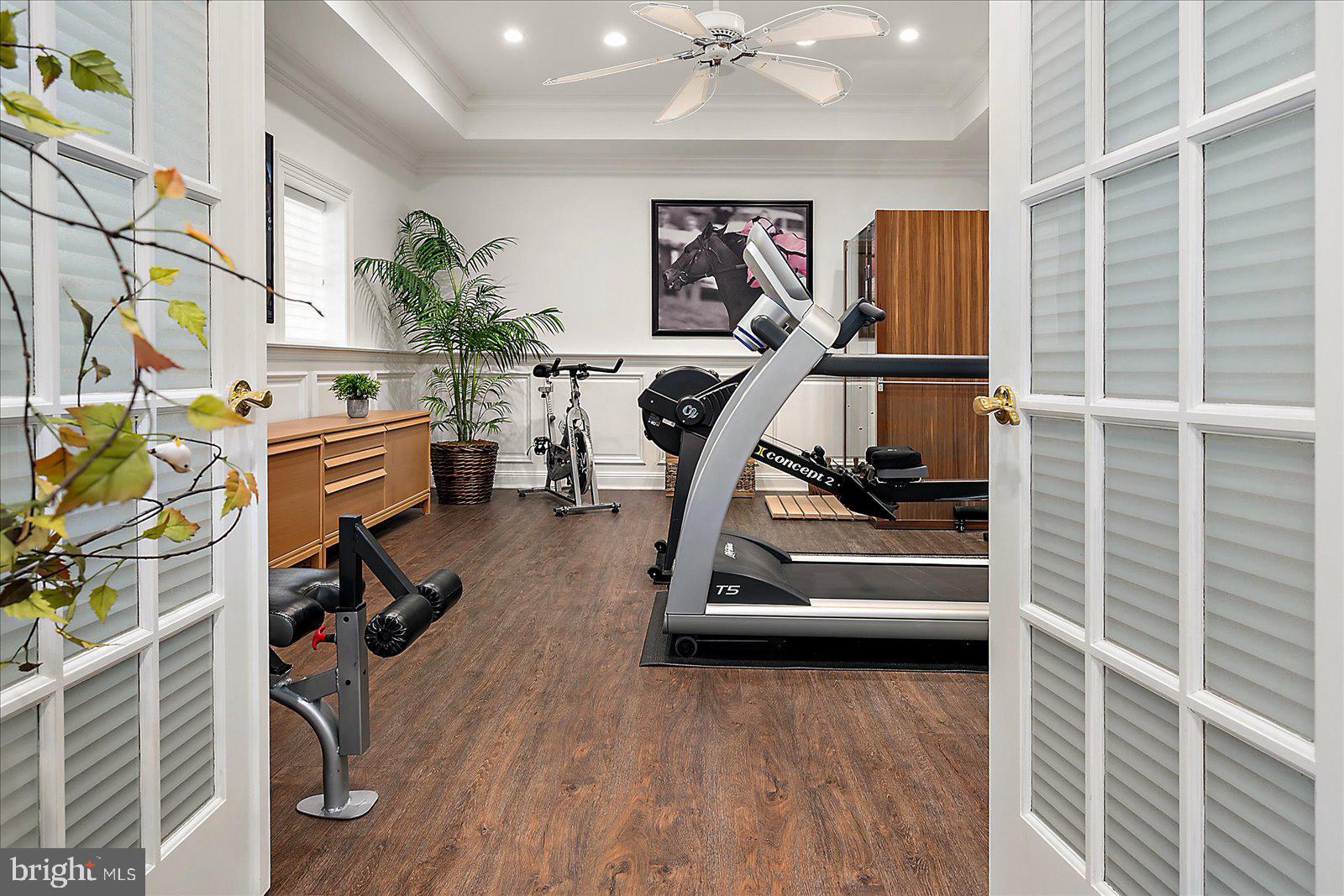 17 Perder Lane Edgewater, MD 21037 - Photo 70 of 115 a view of a room with gym equipment