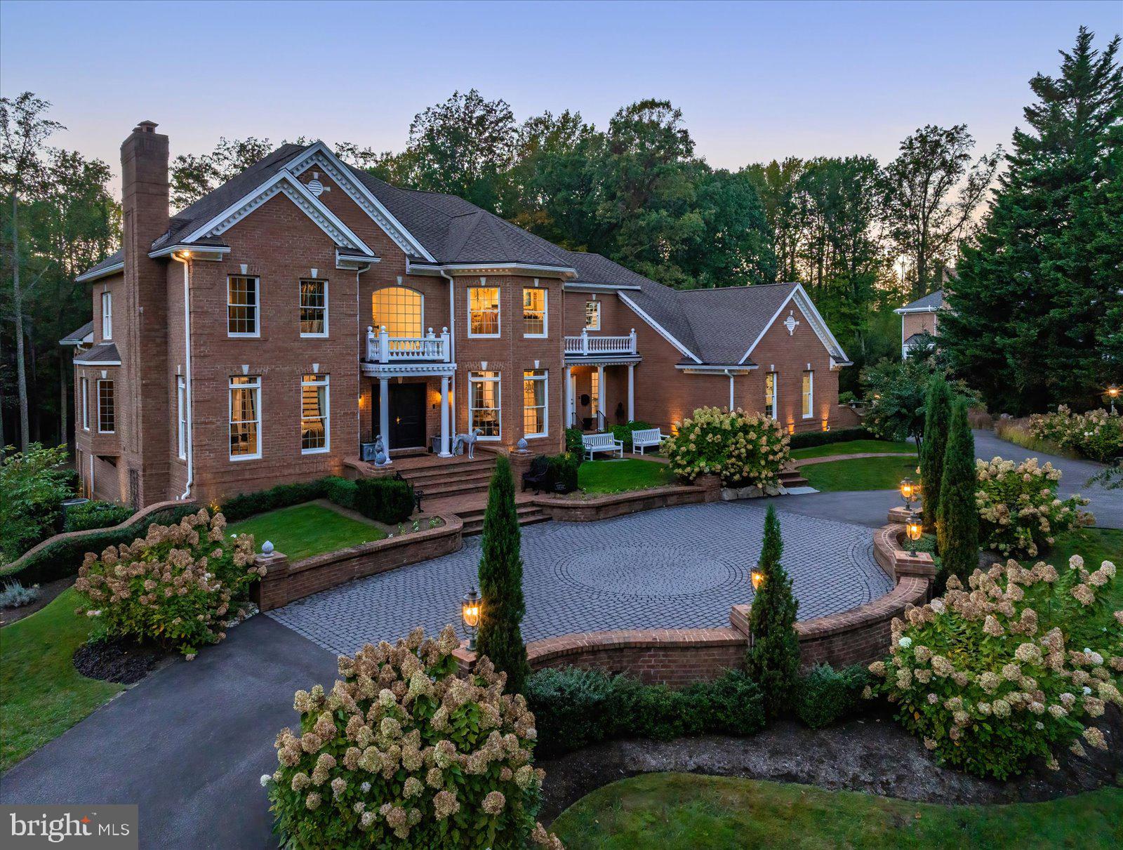 17 Perder Lane Edgewater, MD 21037 - Photo 92 of 115 a front view of a house with a yard and potted plants