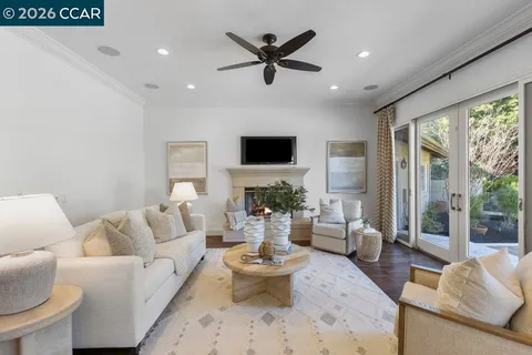 a bedroom with a large bed and a couch