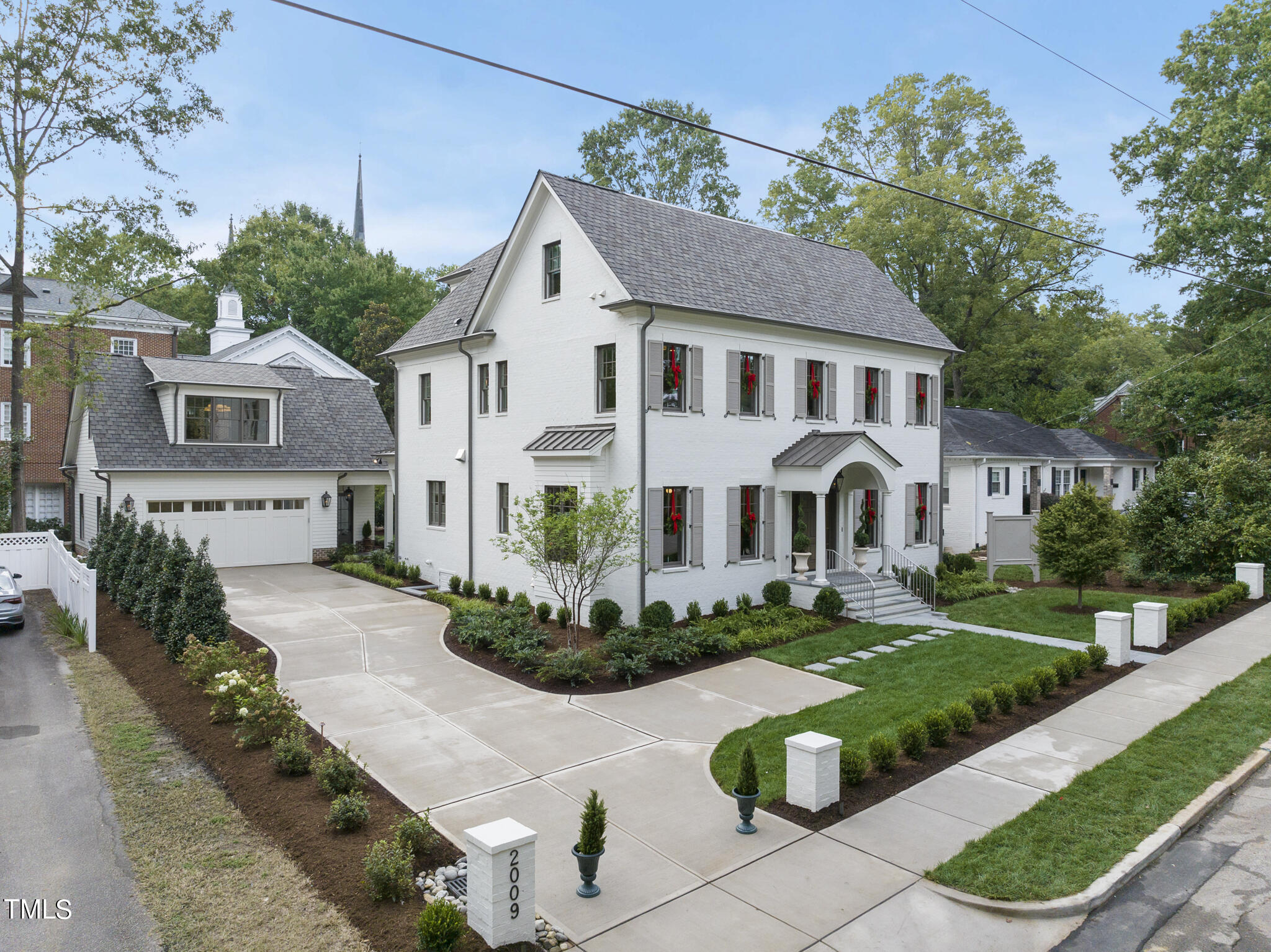 2009 St Marys Street Raleigh, NC 27608 - Photo 2 of 88 a front view of a house with a yard
