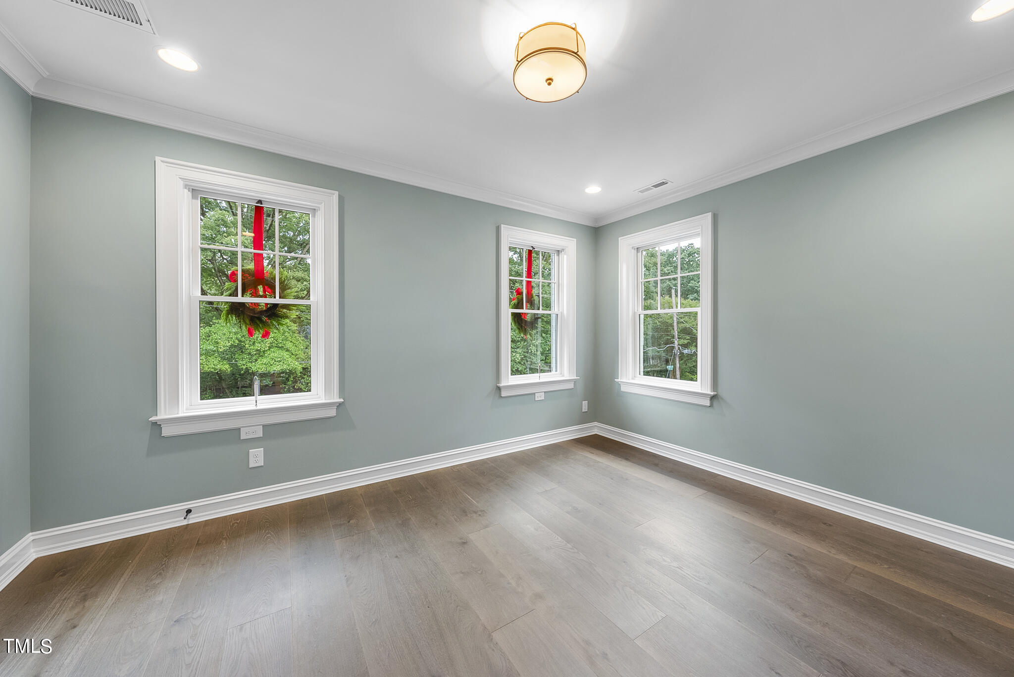 2009 St Marys Street Raleigh, NC 27608 - Photo 36 of 88 an empty room with wooden floor and windows