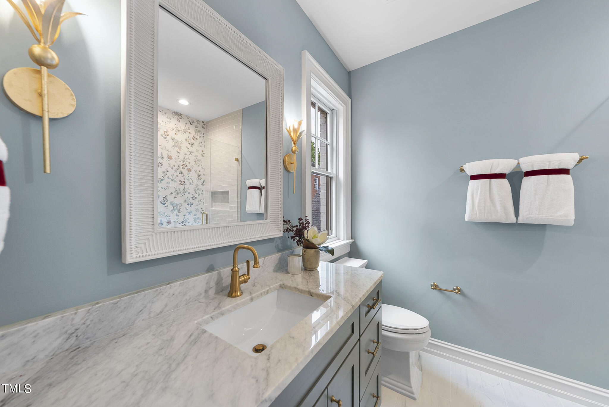 2009 St Marys Street Raleigh, NC 27608 - Photo 37 of 88 a bathroom with a sink and a toilet