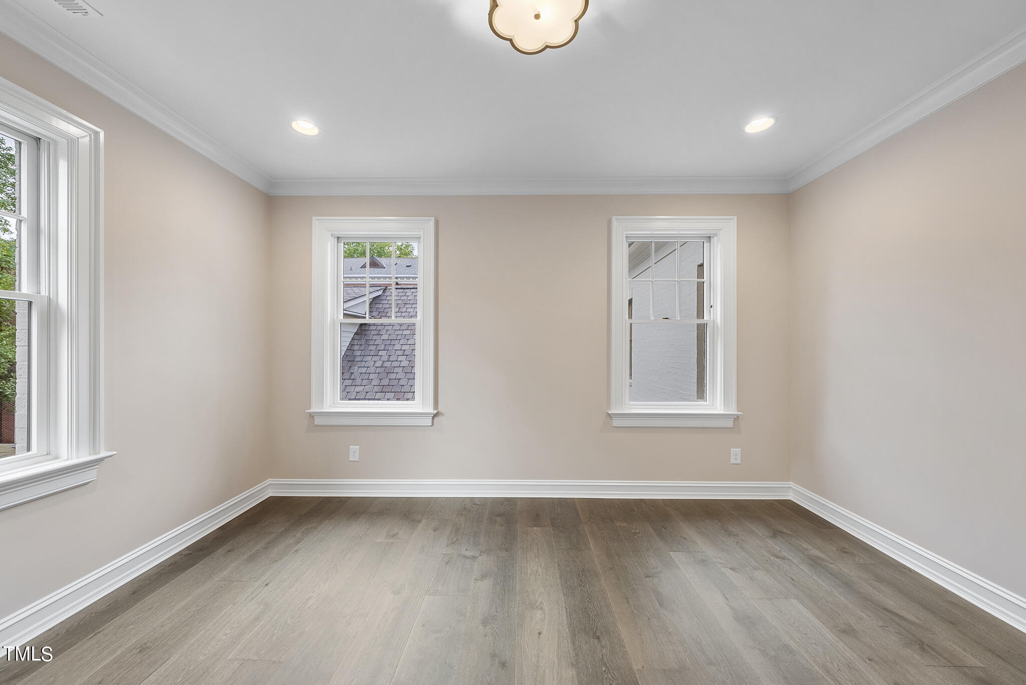 2009 St Marys Street Raleigh, NC 27608 - Photo 49 of 88 an empty room with wooden floor and windows