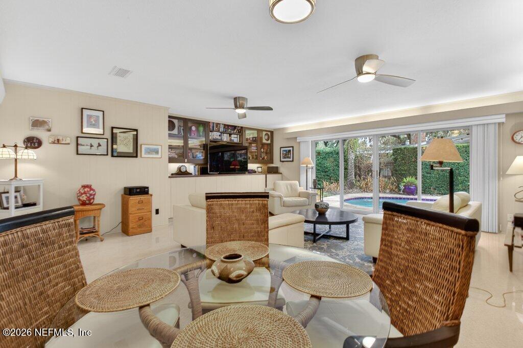 8349 Kim Road Jacksonville, FL 32217 - Photo 22 of 73 a living room with furniture and a large window