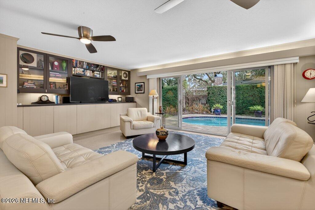 8349 Kim Road Jacksonville, FL 32217 - Photo 5 of 73 a living room with furniture and a large window