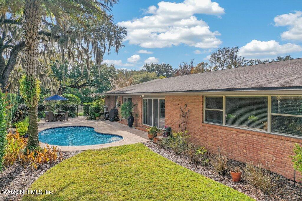 8349 Kim Road Jacksonville, FL 32217 - Photo 73 of 73 a view of a house with backyard and sitting area