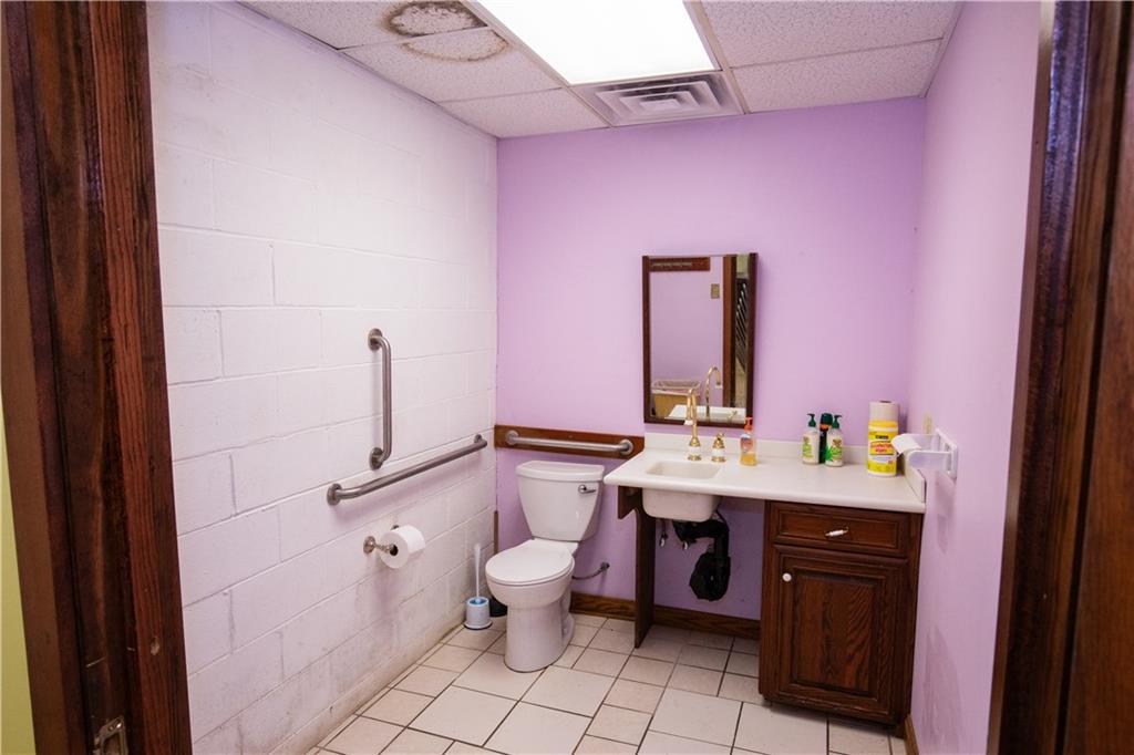222 Rieger Road Butler, PA 16001 - Photo 36 of 41 a bathroom with a sink vanity mirror and toilet