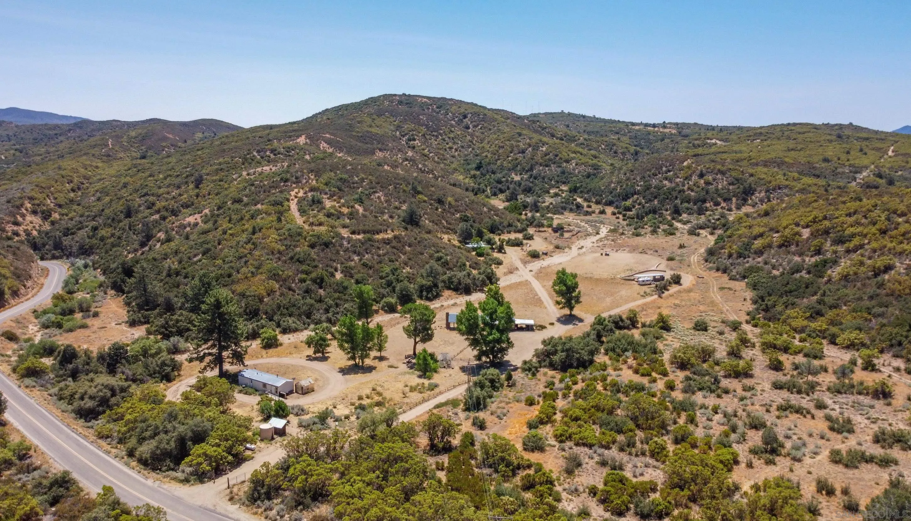 60815 Burnt Valley Road Anza, CA 92539 - Photo 3 of 40 a view of a forest with mountains in the background