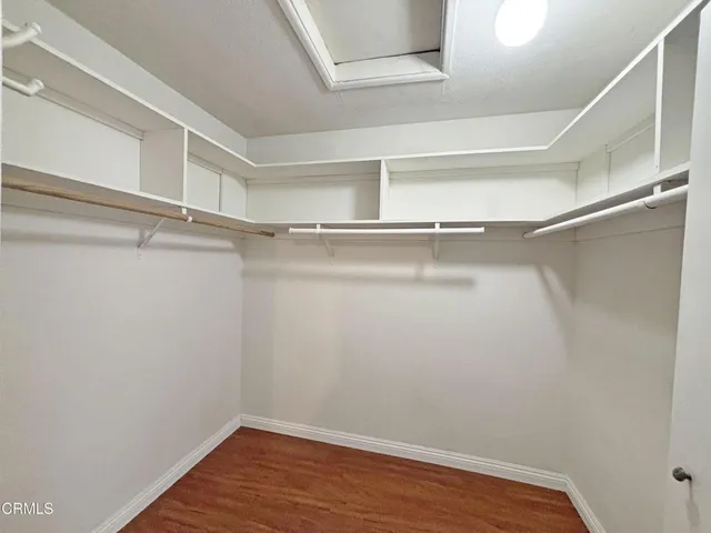 a view of an empty walk in closet