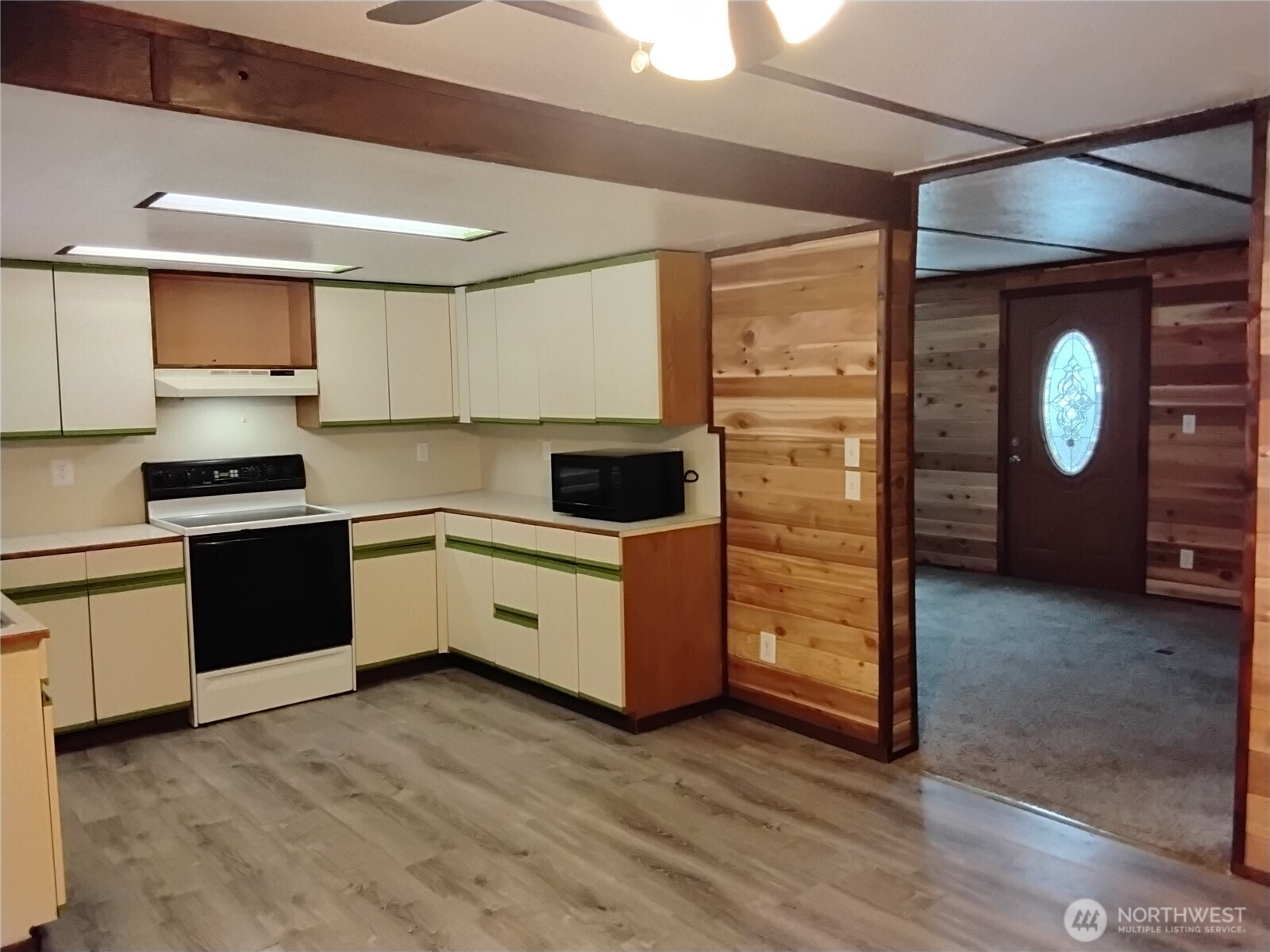 20 Round Up Road Oroville, WA 98844 - Photo 21 of 39 a kitchen with a stove and a refrigerator