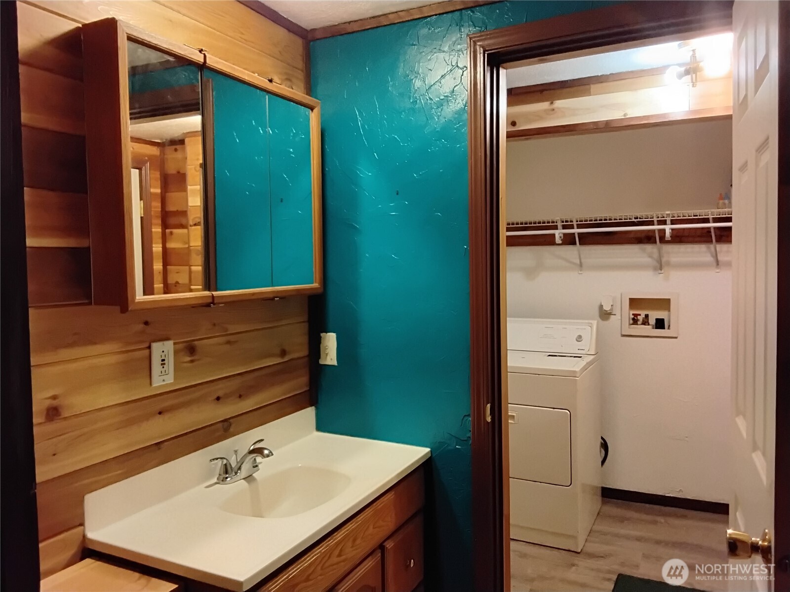 20 Round Up Road Oroville, WA 98844 - Photo 28 of 39 a bathroom with a sink and a mirror