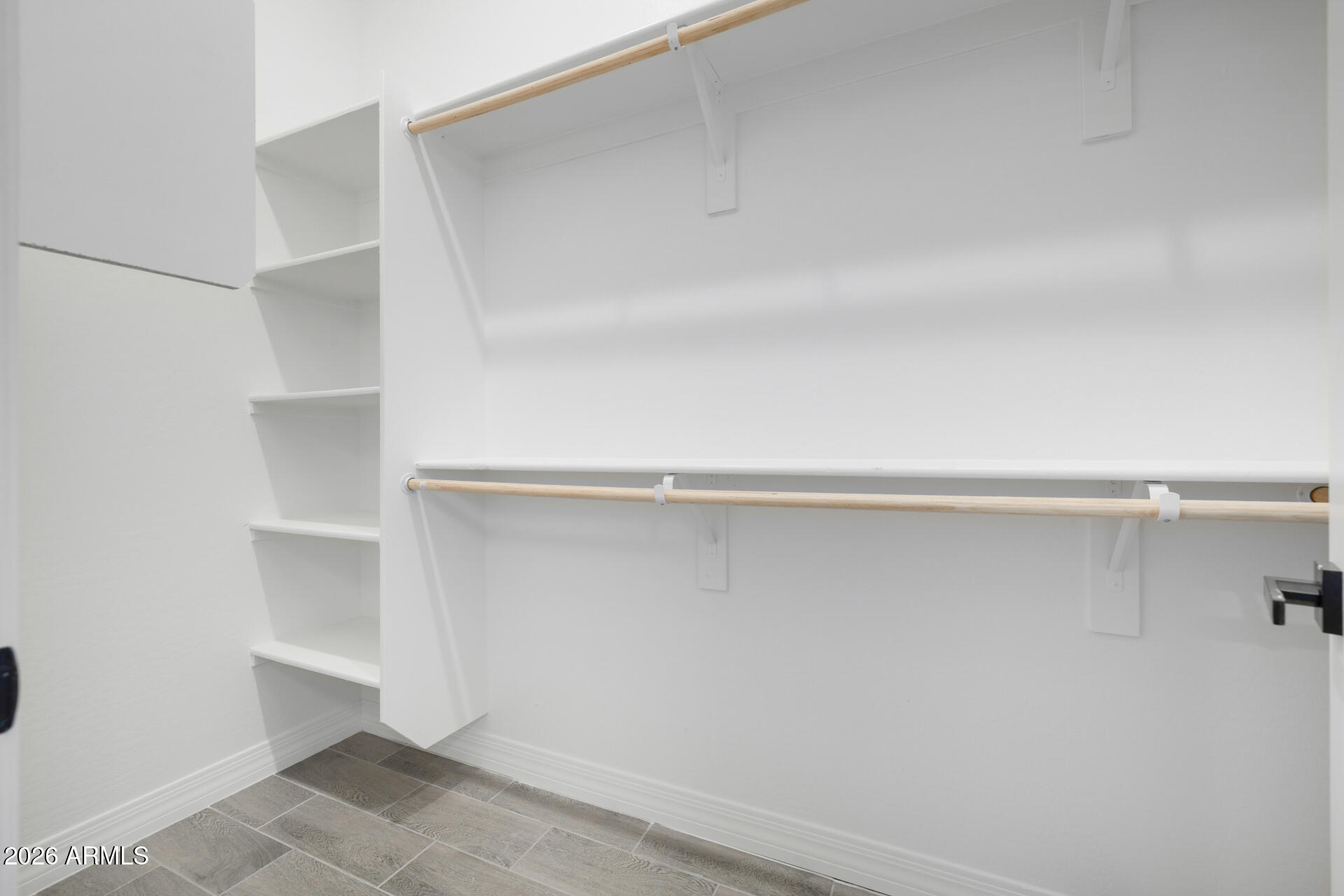 14099 South Vera Cruz Road Arizona City, AZ 85123 - Photo 19 of 32 a view of an empty walk in closet