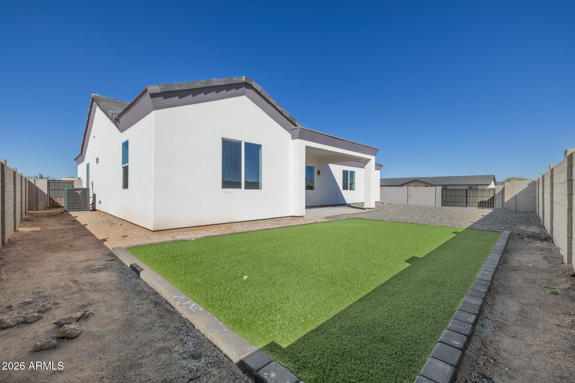 14099 South Vera Cruz Road Arizona City, AZ 85123 - Photo 31 of 32 a view of a backyard of the house