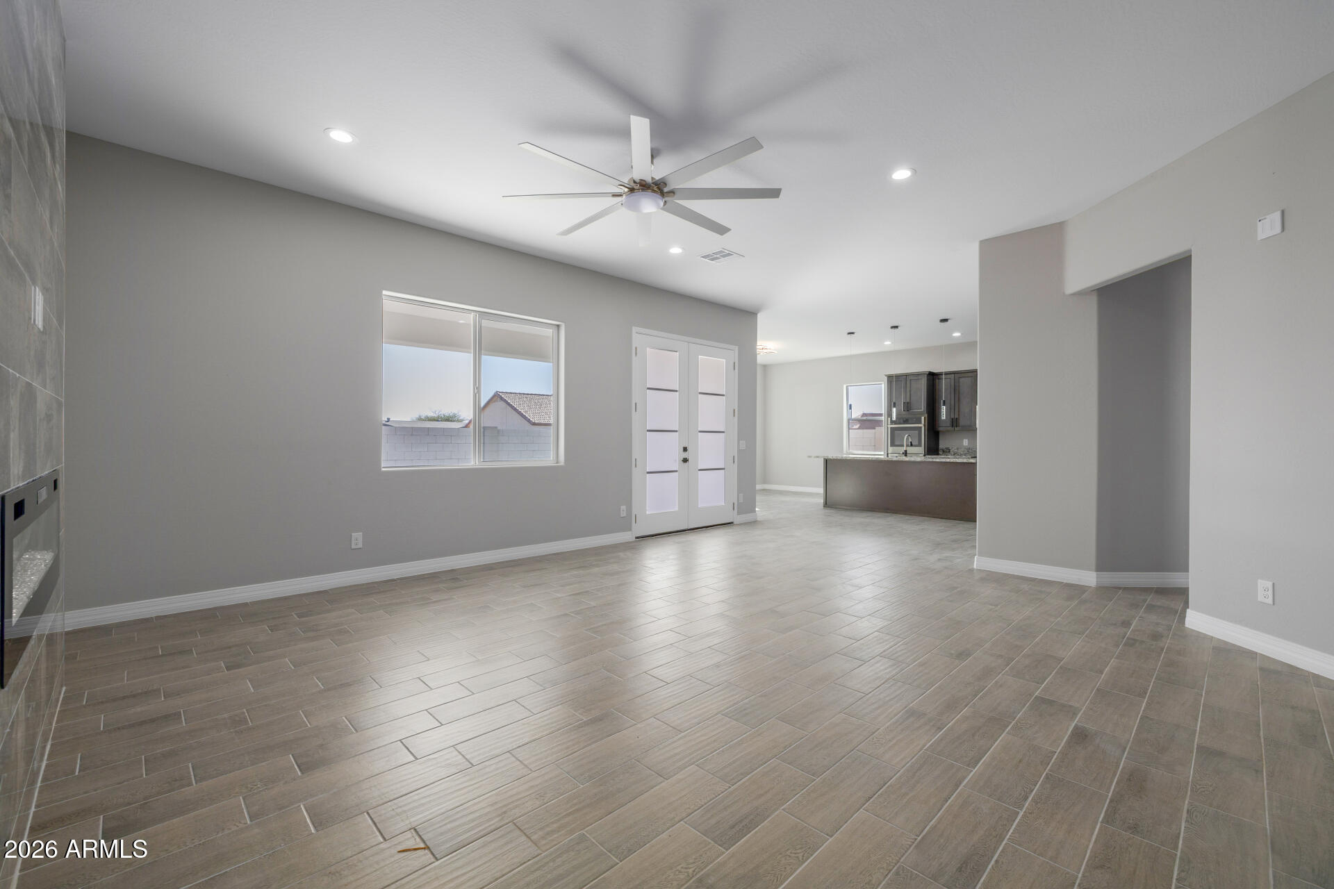 14099 South Vera Cruz Road Arizona City, AZ 85123 - Photo 5 of 32 a view of a kitchen with a sink and a window