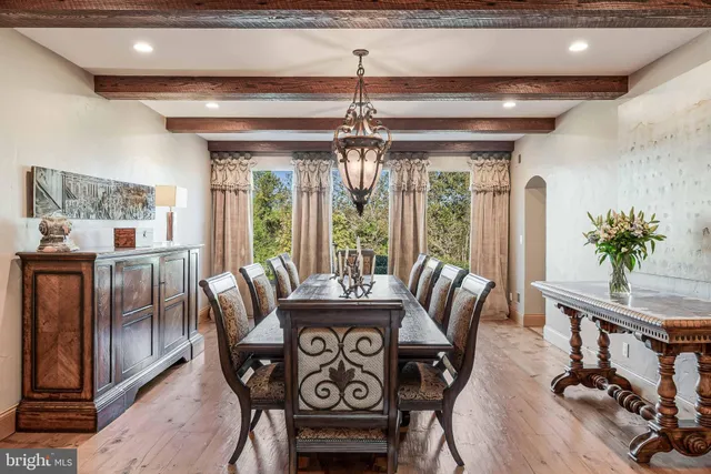 a dining room with furniture and window