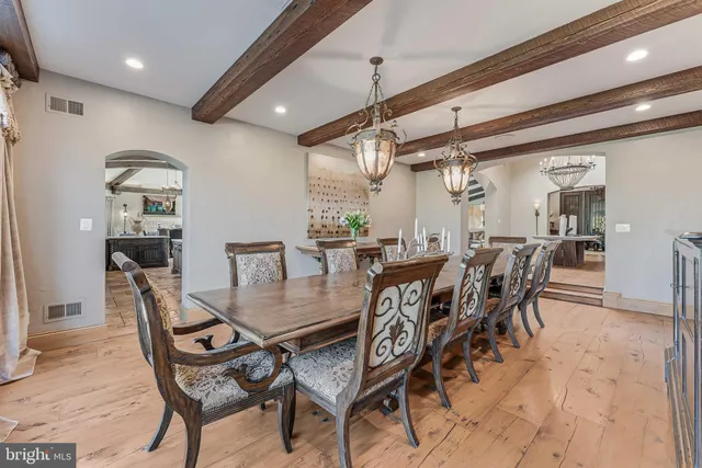 a kitchen with stainless steel appliances granite countertop a stove and a sink
