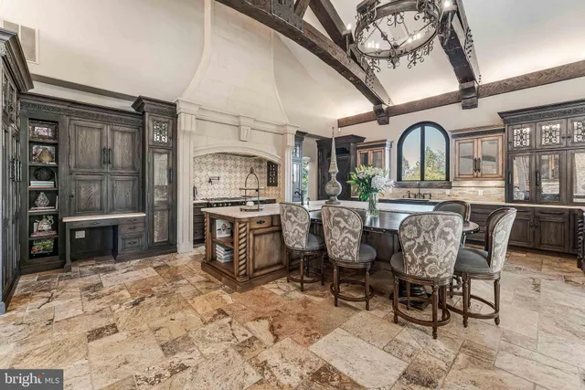 a kitchen with a stove and a sink