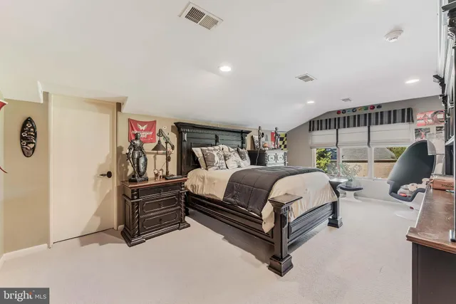 view of hall way with mirror