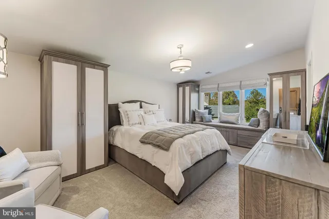 a bathroom with a shower and a bath tub