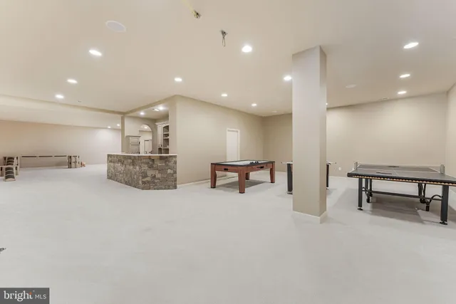 a bathroom with a sink a mirror and a shower