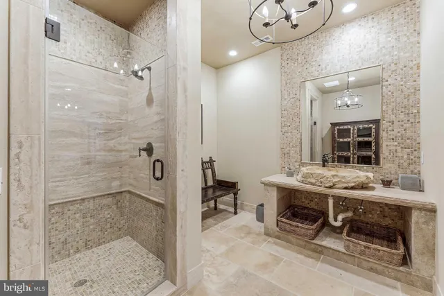 a large white building with lots of dining table and chairs