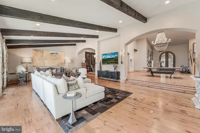 a view of swimming pool with outdoor seating