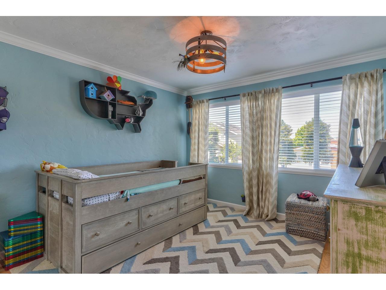 73 Melway Circle Monterey, CA 93940 - Photo 23 of 46 a room with a bed and a window