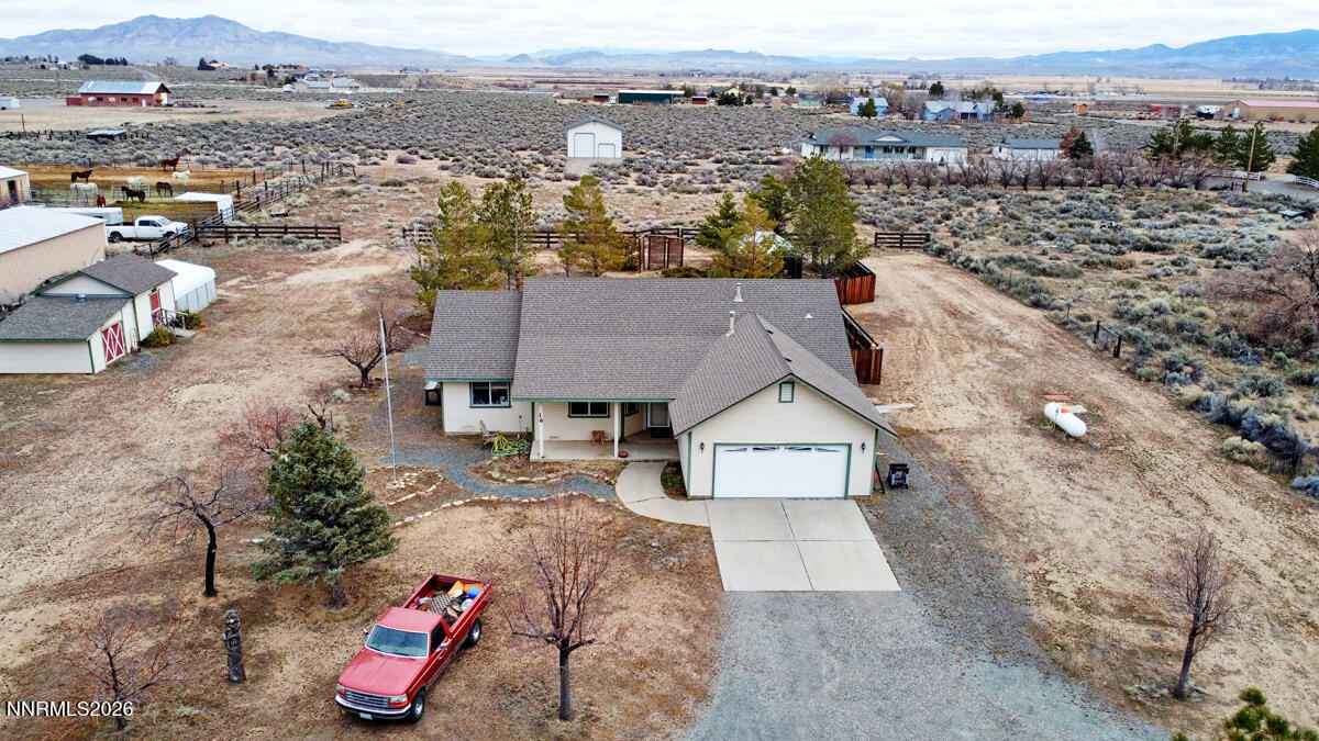16 Mesa Drive Smith Valley, NV 89444 - Photo 1 of 33 an aerial view of a house with a yard